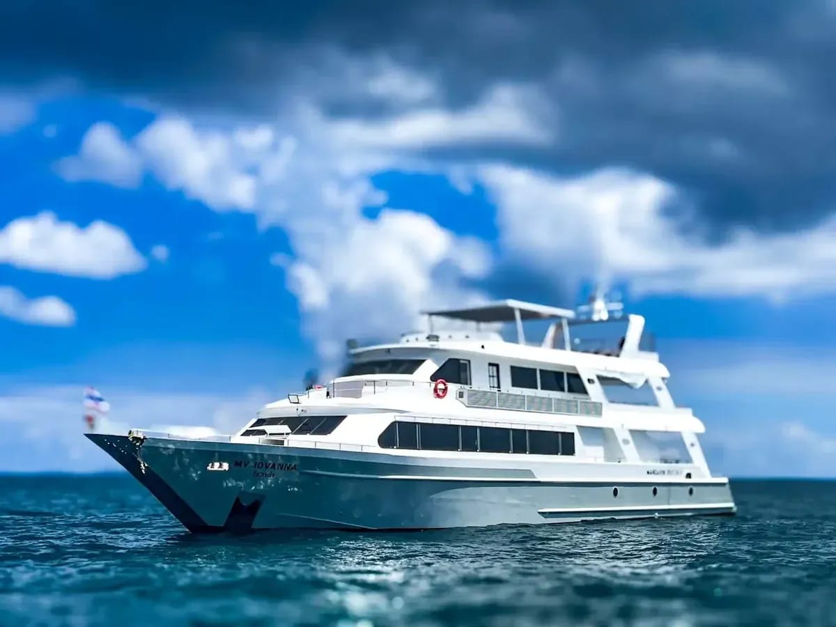 MV Jovanna liveaboard at sunset with divers on deck